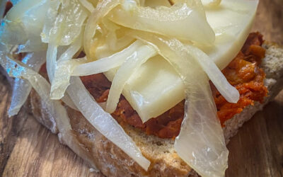 Almussafes Appetizer with Mallorcan Smoked Sausage, Cheese, and Caramelized Onion