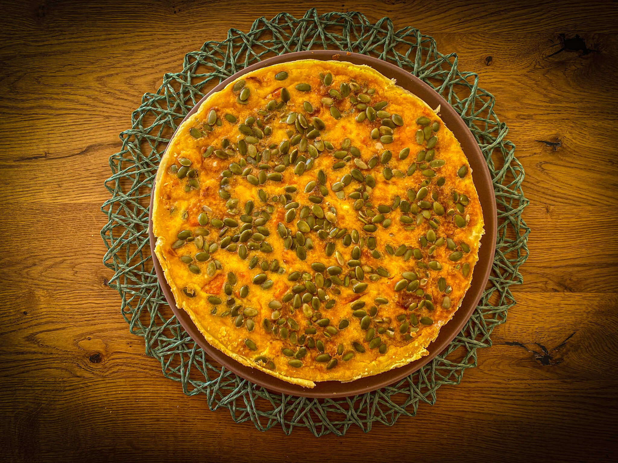 Pumpkin and goat cheese quiche plated