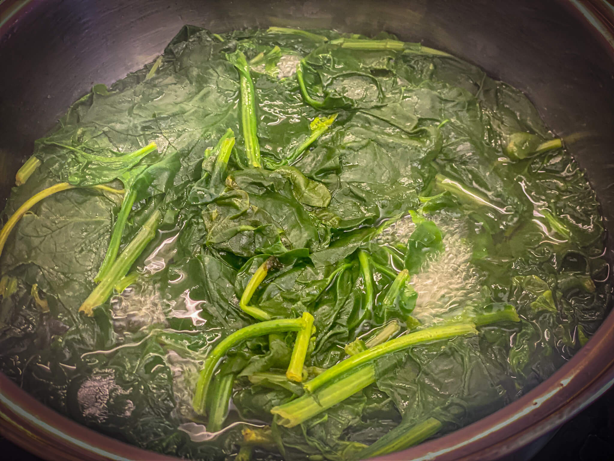 Spinach with Tomato and Anchovies boil spinach