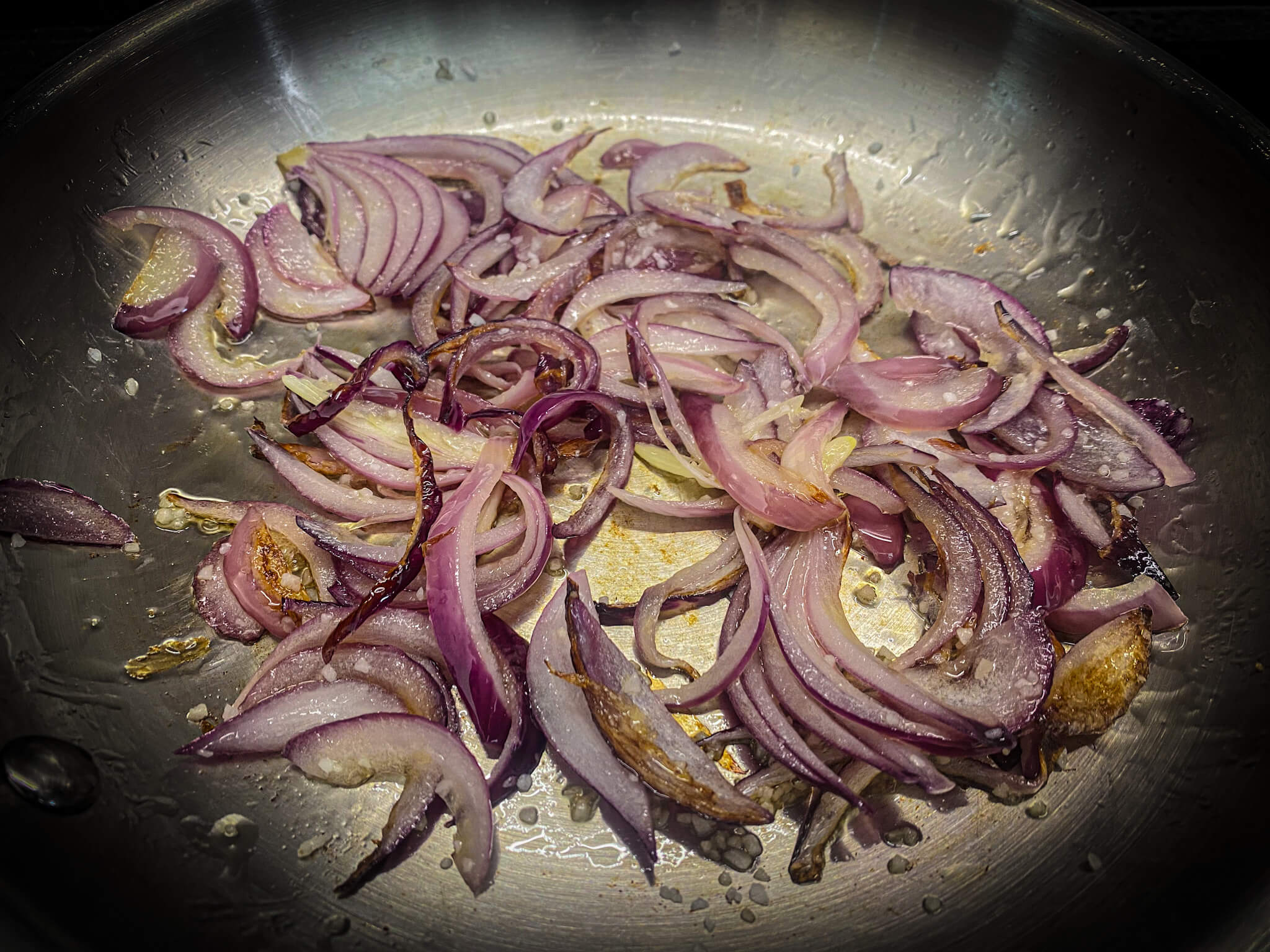 Spinach with Tomato and Anchovies fried onion