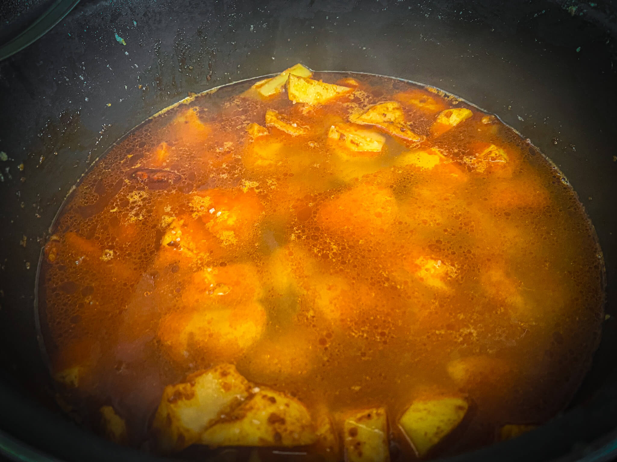 All i Pebre stew Paprika potatoes boiling 1