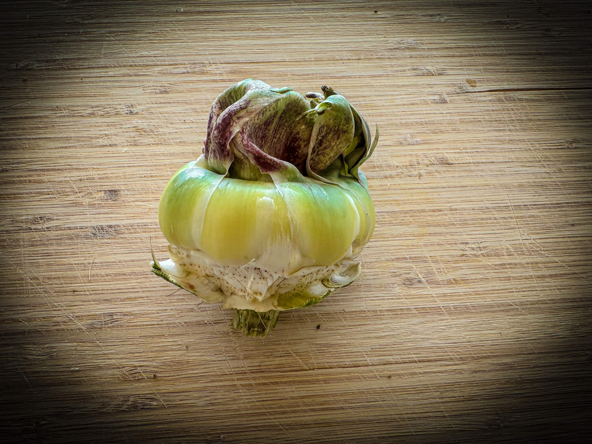 Artichoke Hearts with Garlic Shrimp Artichokes peel step 3