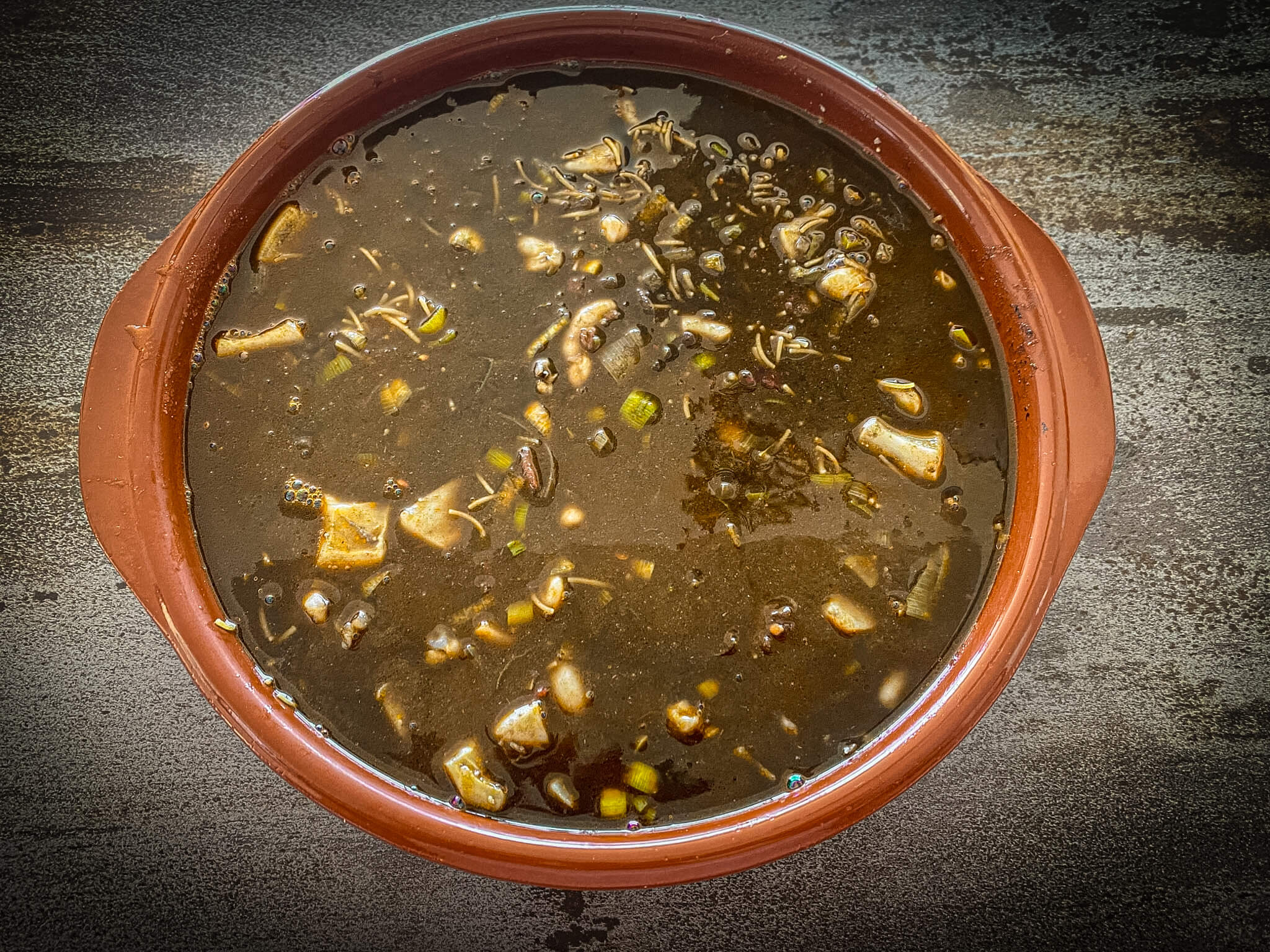 Seafood Black Fideuá with Prawns fiah stock