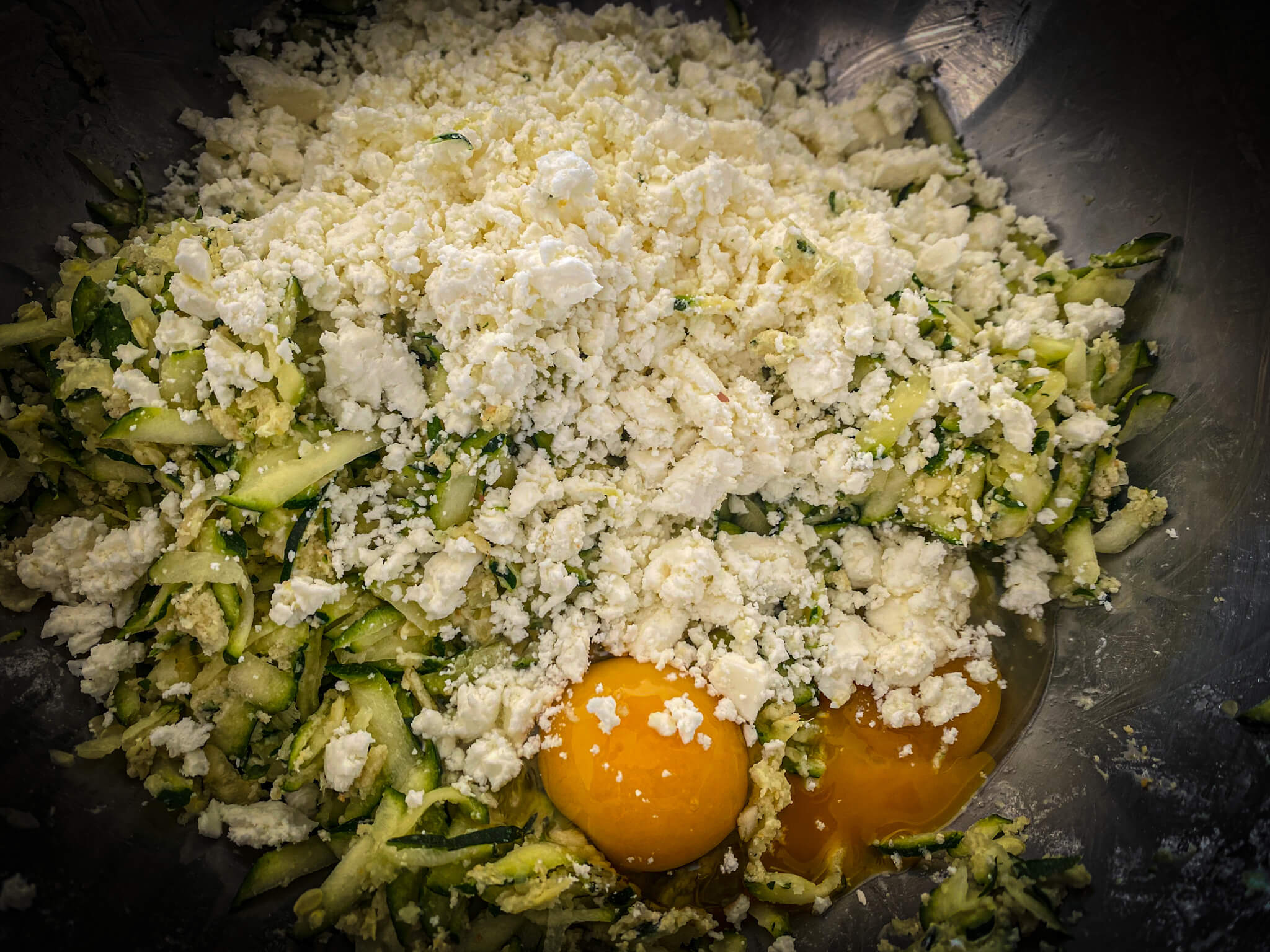 Greek zucchini fritters grated zucchini add eggs