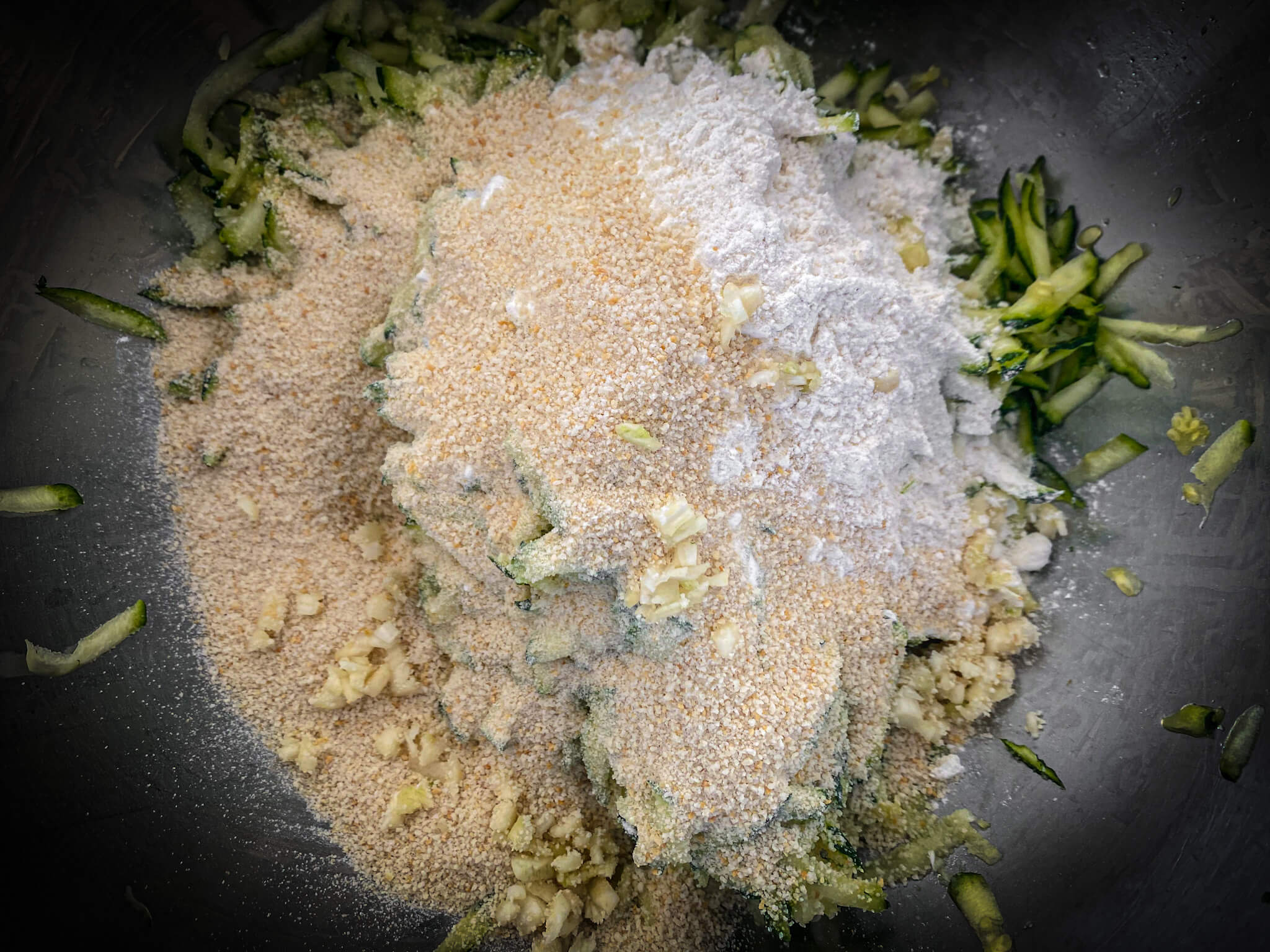 Greek zucchini fritters grated zucchini add flour and breadcrumbs 2