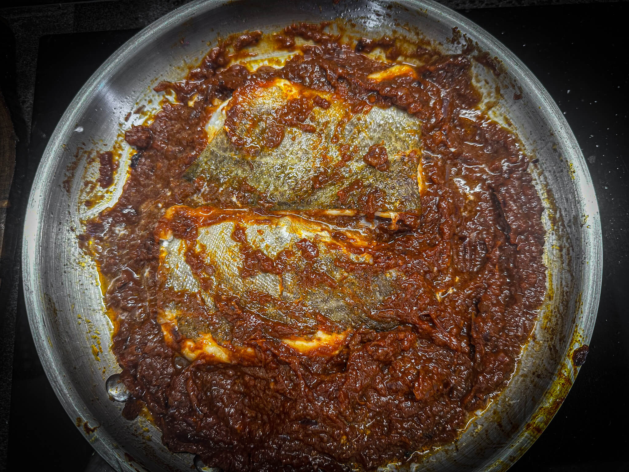 Bacalao a la vizcaina add sauce on cod