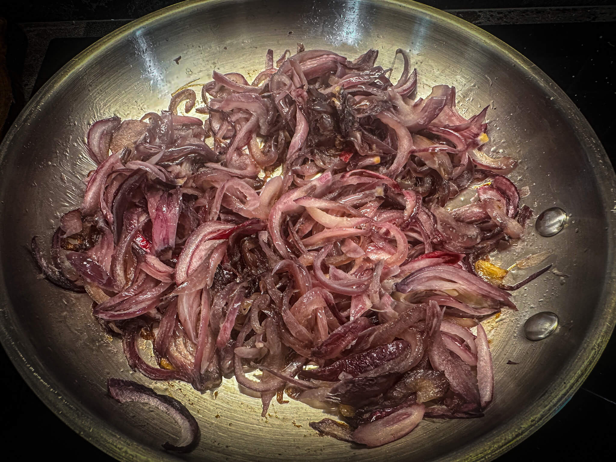 Bacalao a la vizcaina red onion caramelized