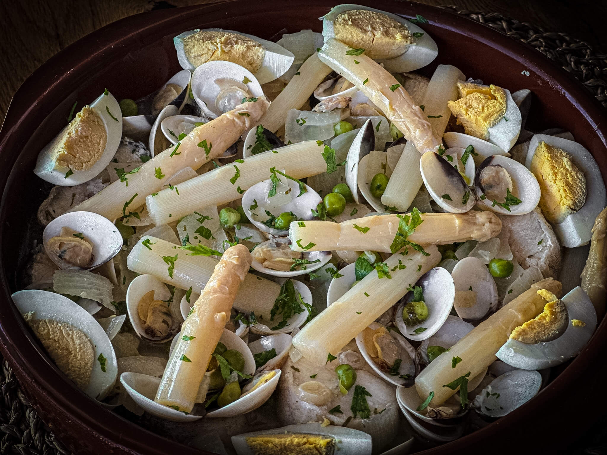 Basque-Style Hake with Clams plated close