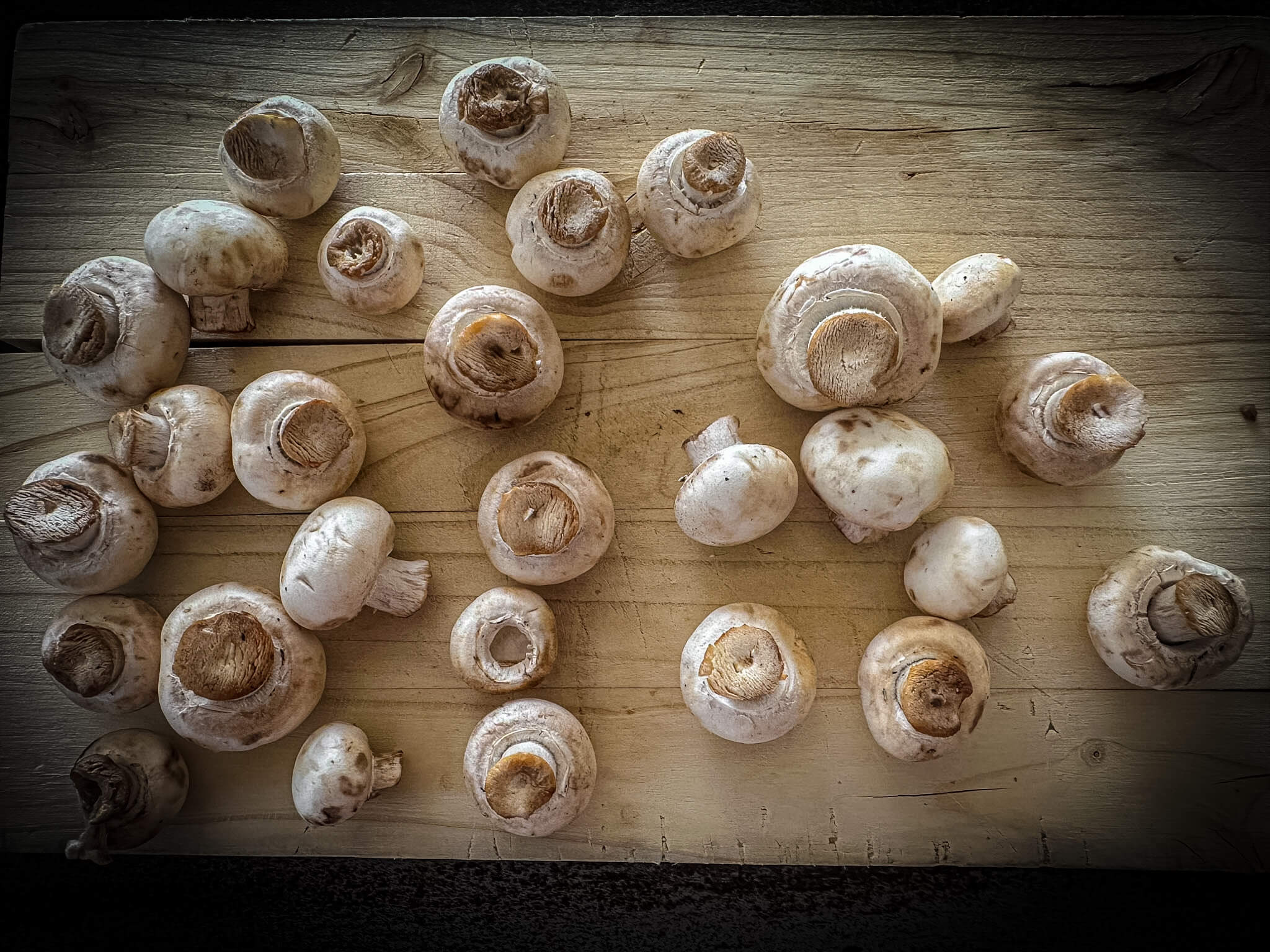 Spanish Garlic Mushrooms cutting mushrooms