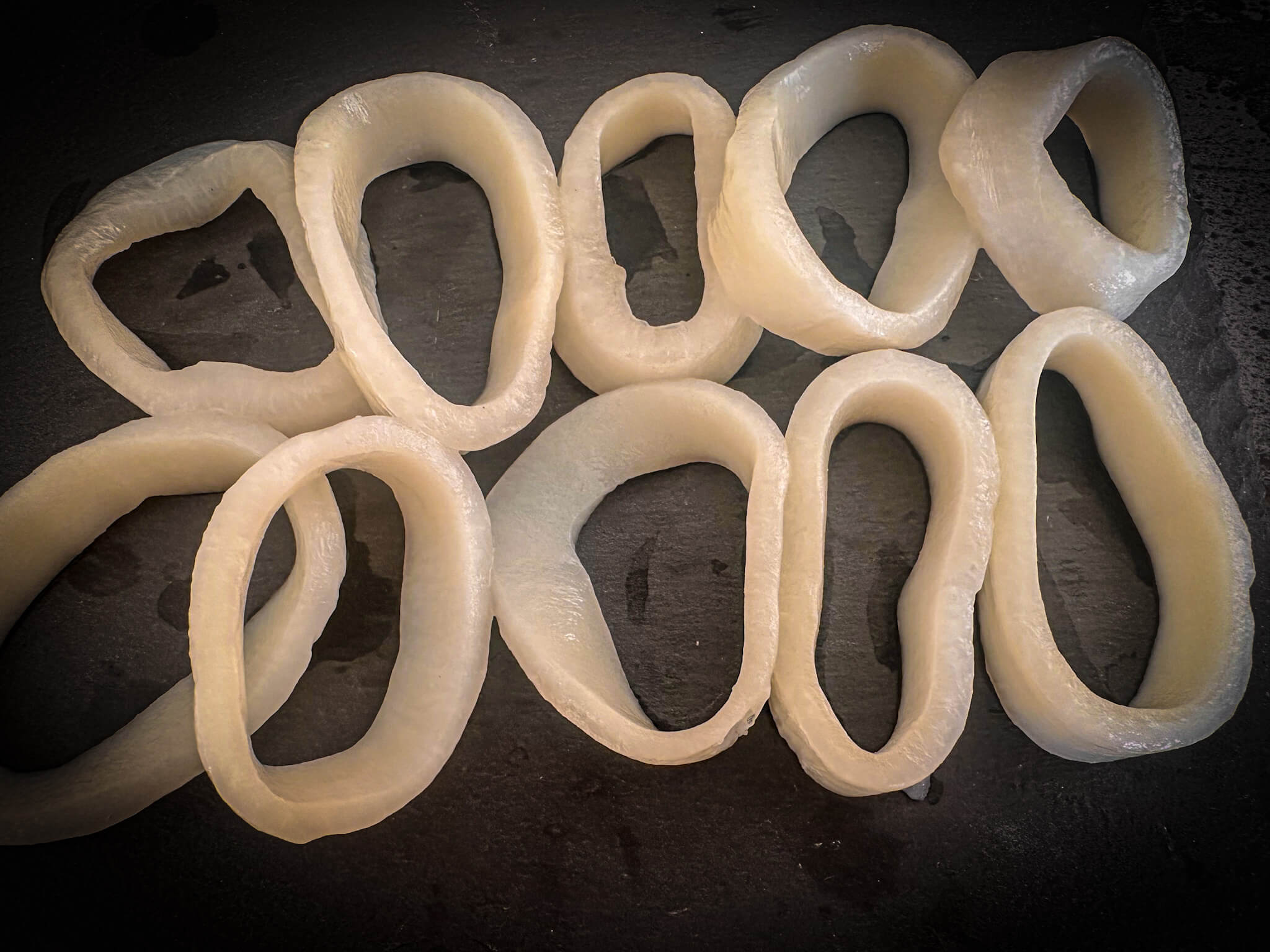 Madrid-Style Calamari Sandwich - Cleaned Fresh Squid Rings Close Up