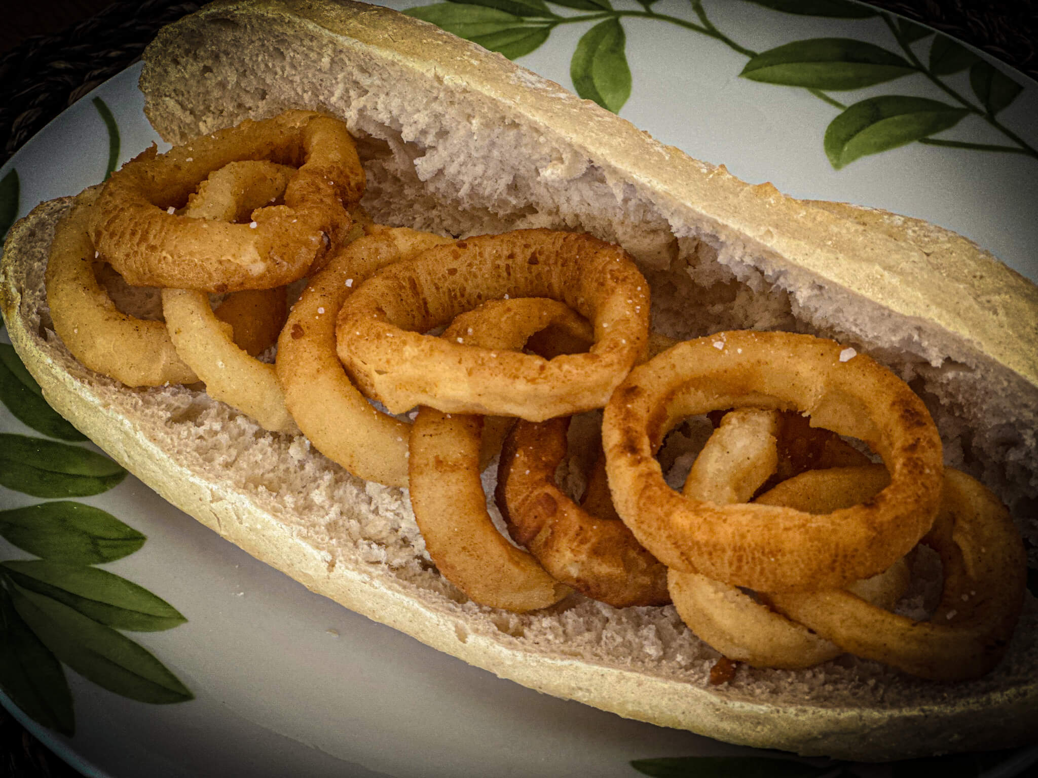 Madrid-Style Calamari Sandwich - Crispy Calamari Rings in Bread Roll Detailed View