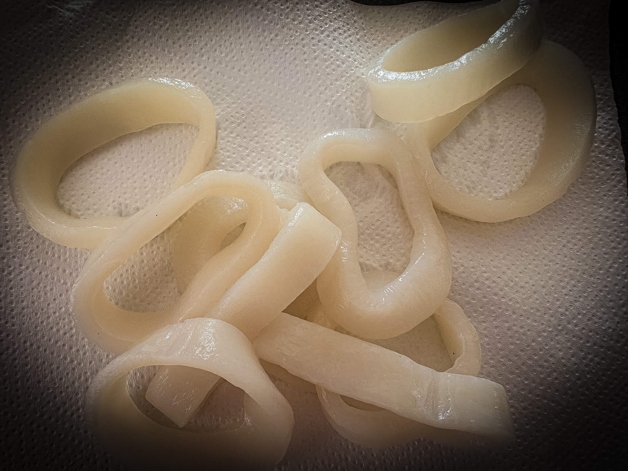 Madrid-Style Calamari Sandwich - Sliced Squid Rings on Paper Towel