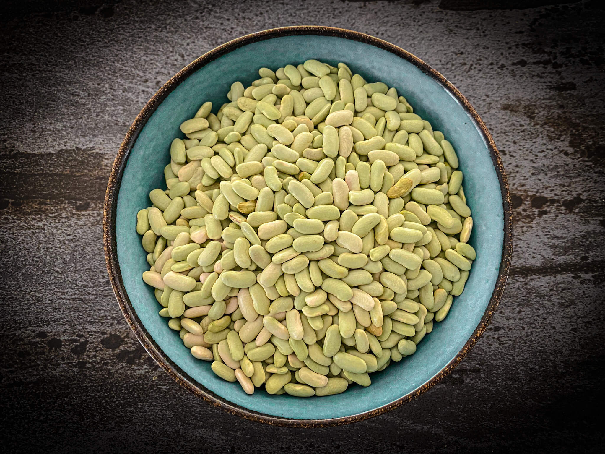 Traditional Asturian Verdinas Beans with Fresh Clams - Bowl of Dried Green Beans Flatlay